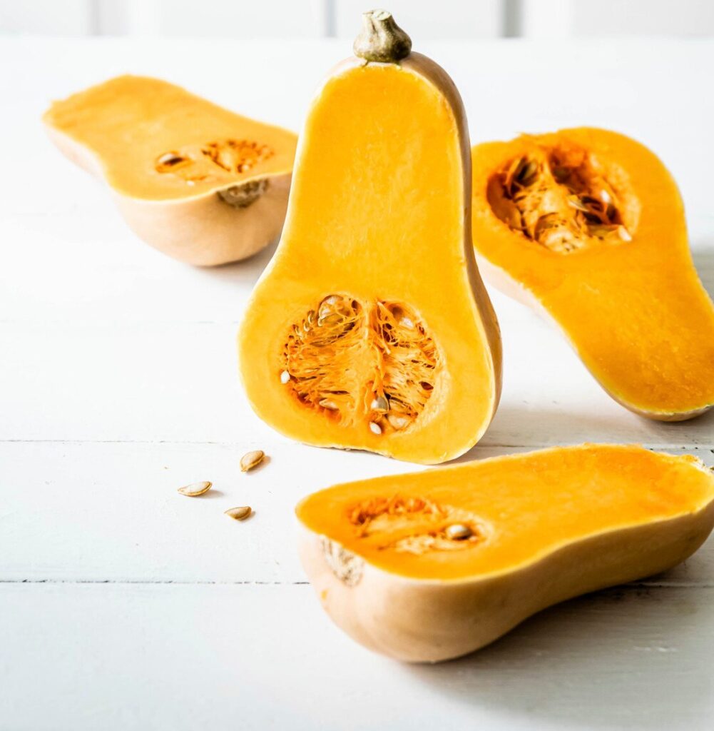 butternut squash halves white wooden table 53876 96846