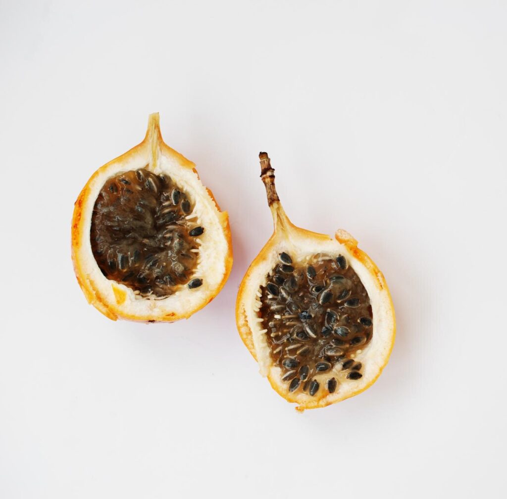 closeup photo two halves passion fruit table 627829 8197