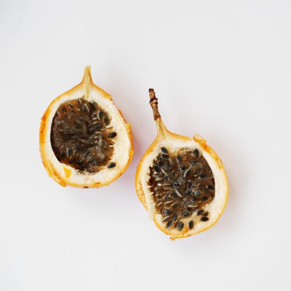 closeup photo two halves passion fruit table 627829 8197