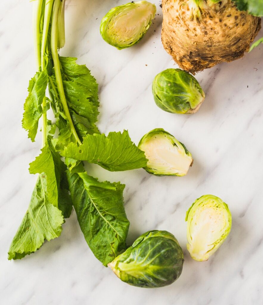 elevated view celery brussels sprouts turnip florence fennel marble background 23 2147956487